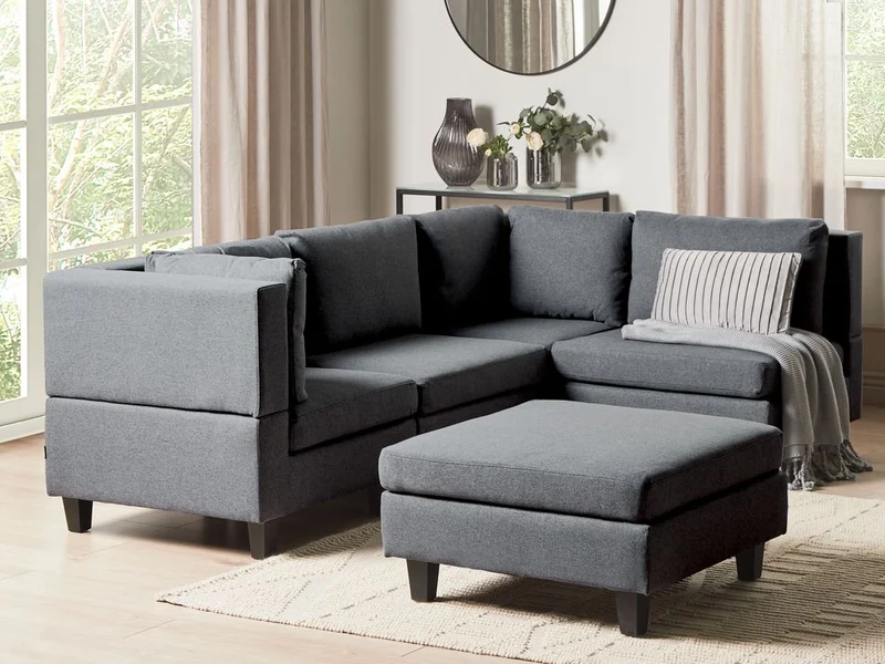 Divano componibile a 4 posti imbottito in tessuto grigio scuro gambe nere lato sinistro con ottomana stile moderno