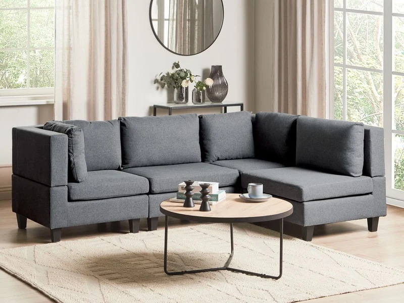 Divano componibile a 4 posti imbottito in tessuto grigio scuro gambe nere lato sinistro con ottomana stile moderno